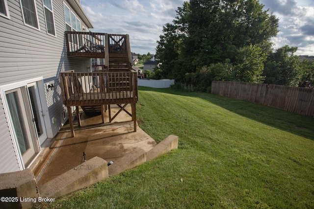 view of yard featuring a wooden deck