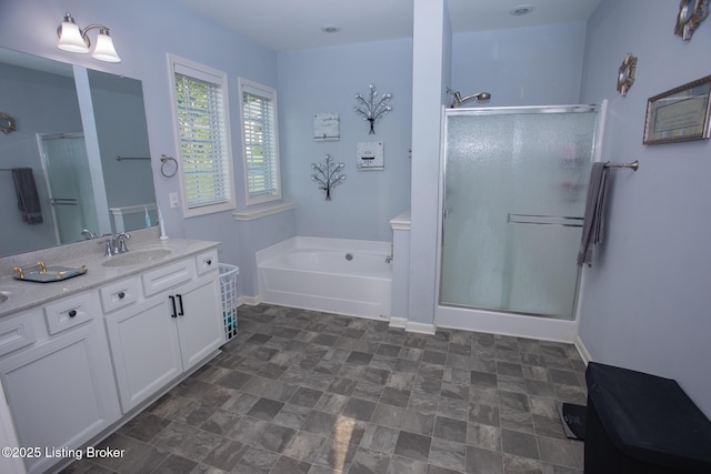 bathroom with plus walk in shower and vanity