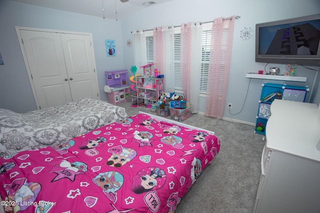 carpeted bedroom featuring a closet