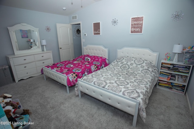 bedroom with light colored carpet