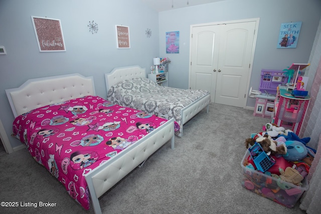 carpeted bedroom featuring a closet