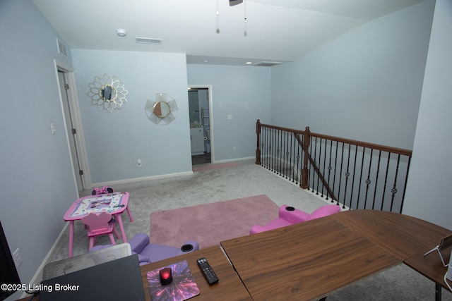 interior space with lofted ceiling and carpet