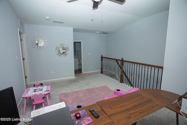 playroom with vaulted ceiling, ceiling fan, and carpet flooring