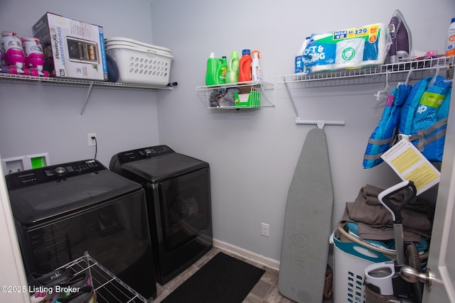 laundry room with washer and clothes dryer