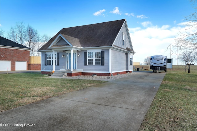 view of front facade featuring a garage and a front yard