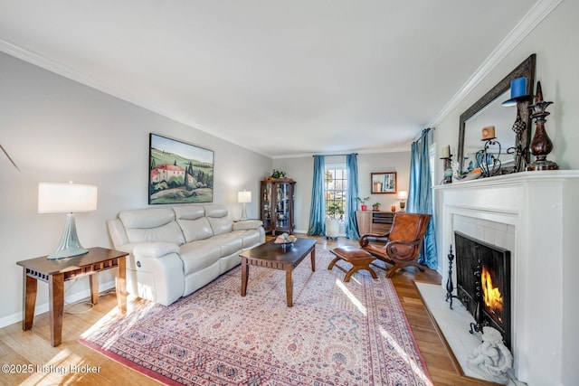 living room with crown molding and light wood-type flooring