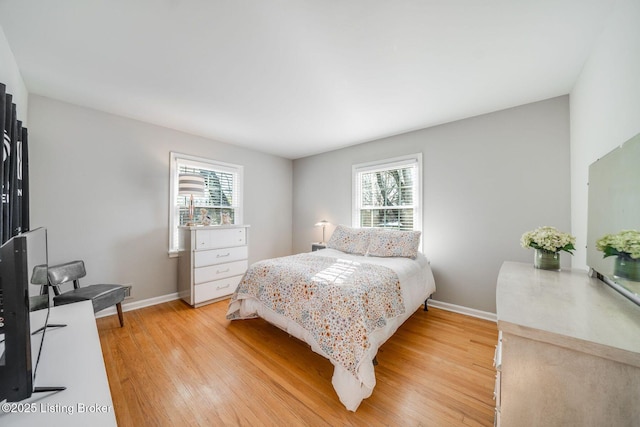 bedroom featuring light wood-type flooring