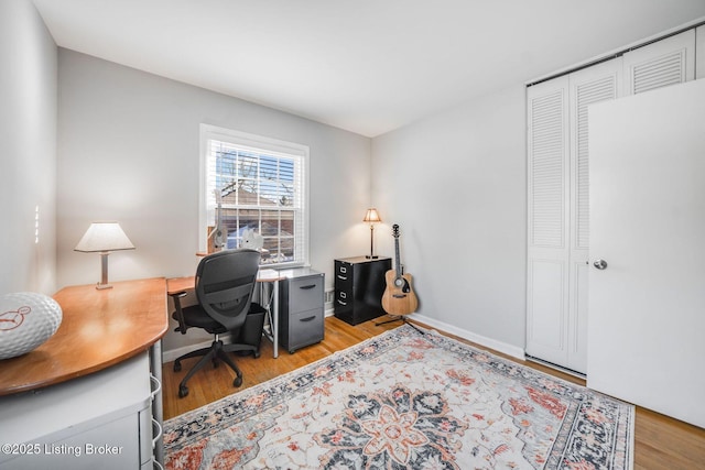 home office with light wood-type flooring