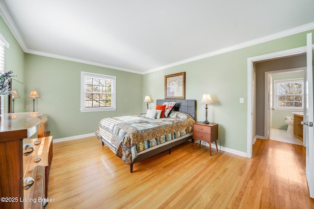 bedroom with multiple windows, ornamental molding, and light hardwood / wood-style floors