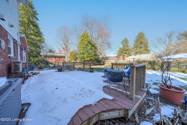 view of snow covered deck