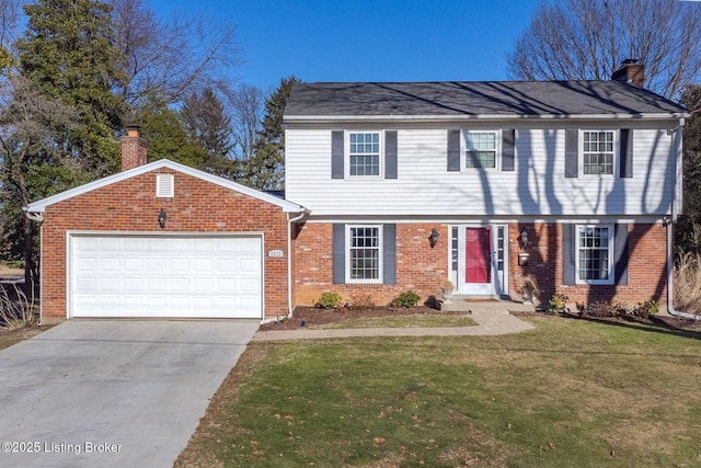 view of front of home featuring a garage and a front yard