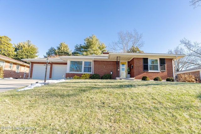 ranch-style house with a garage and a front lawn