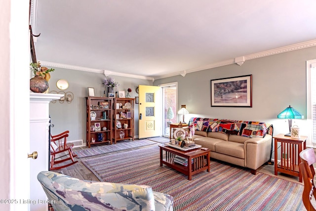 living room featuring ornamental molding and hardwood / wood-style floors