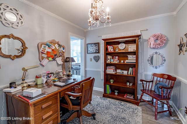 office featuring ornamental molding, a chandelier, and light wood-type flooring