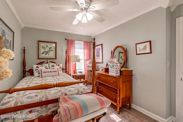 bedroom featuring ceiling fan, ornamental molding, and wood-type flooring