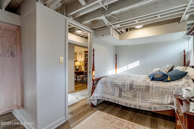 bedroom featuring hardwood / wood-style floors