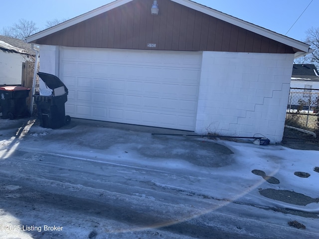 garage featuring fence