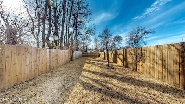 view of yard featuring fence