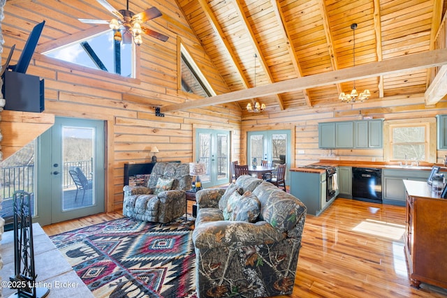 living room with french doors, wooden ceiling, light wood-type flooring, and wood walls