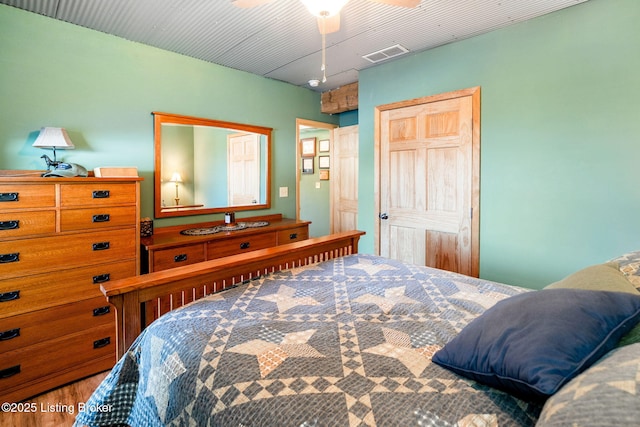 bedroom featuring hardwood / wood-style flooring and a closet