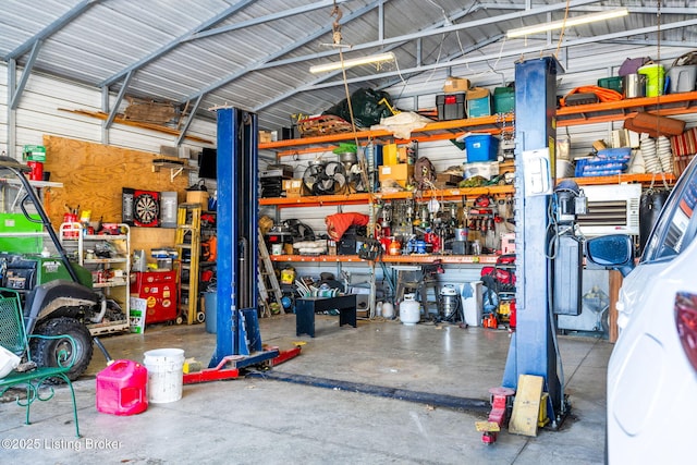 garage with a workshop area