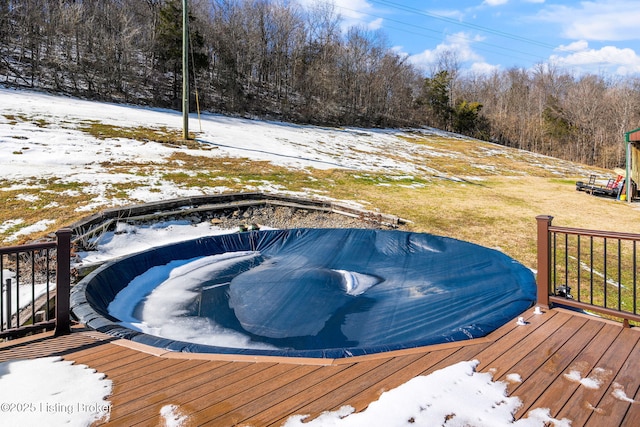 view of snow covered deck