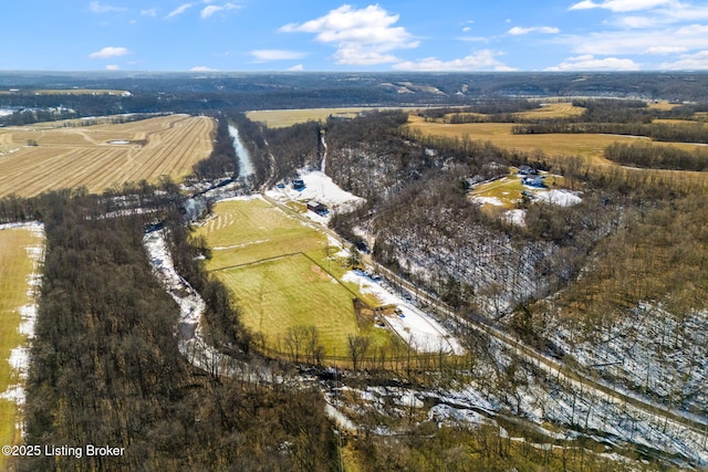 birds eye view of property featuring a rural view