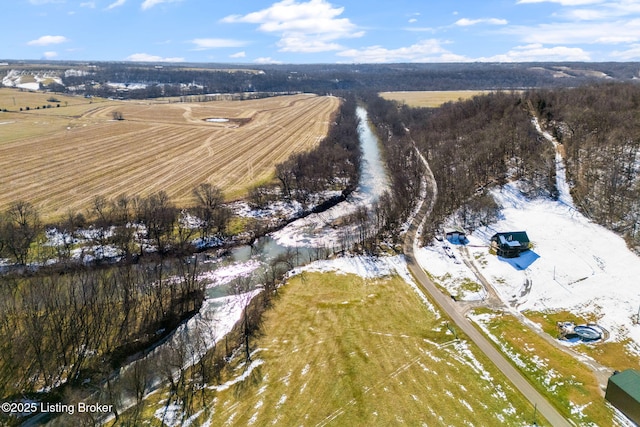 birds eye view of property featuring a rural view