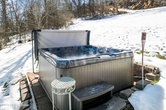 exterior space with a hot tub