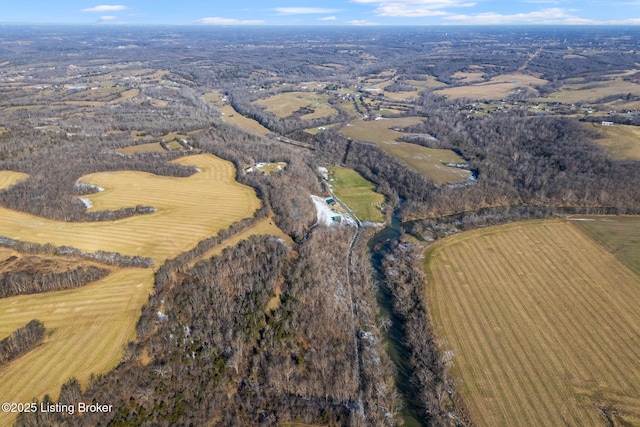 birds eye view of property featuring a rural view