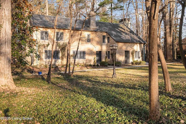 exterior space with a lawn