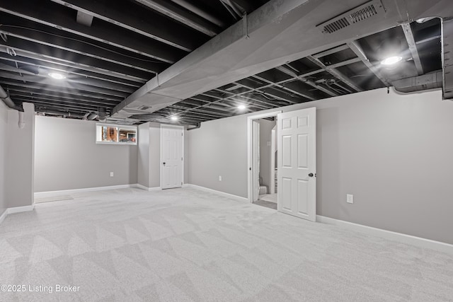 basement with carpet floors