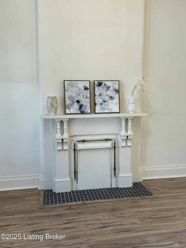 interior details featuring hardwood / wood-style flooring