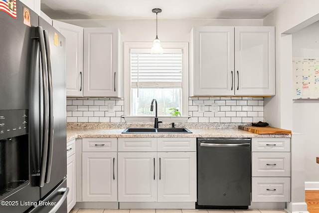 kitchen featuring white cabinetry, sink, black dishwasher, and stainless steel fridge with ice dispenser