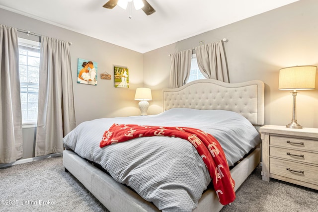 bedroom with light carpet and ceiling fan