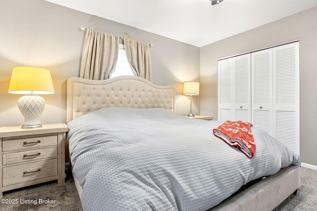 carpeted bedroom with a closet