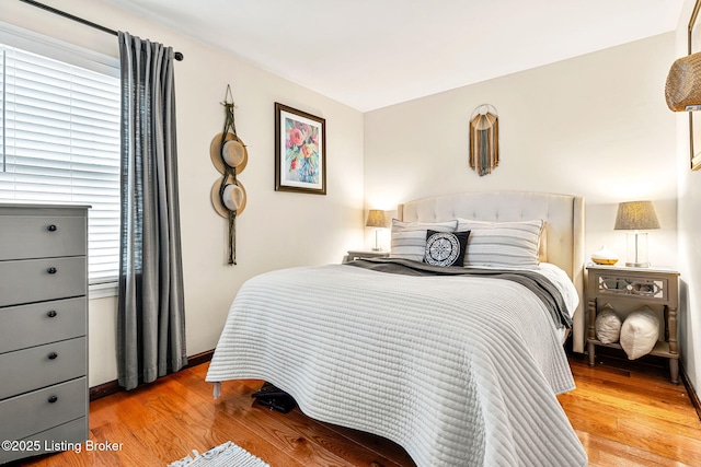 bedroom featuring light wood-type flooring