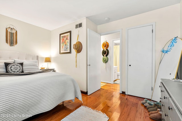 bedroom featuring light hardwood / wood-style flooring