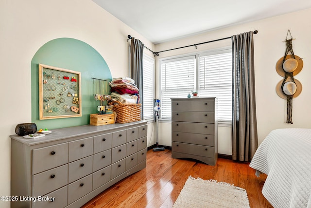 bedroom with light hardwood / wood-style floors