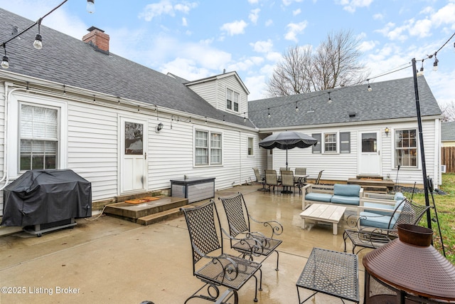 rear view of house featuring a patio area