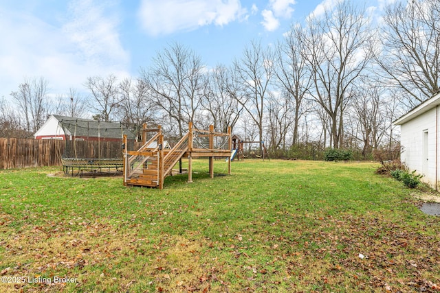 view of yard featuring a wooden deck