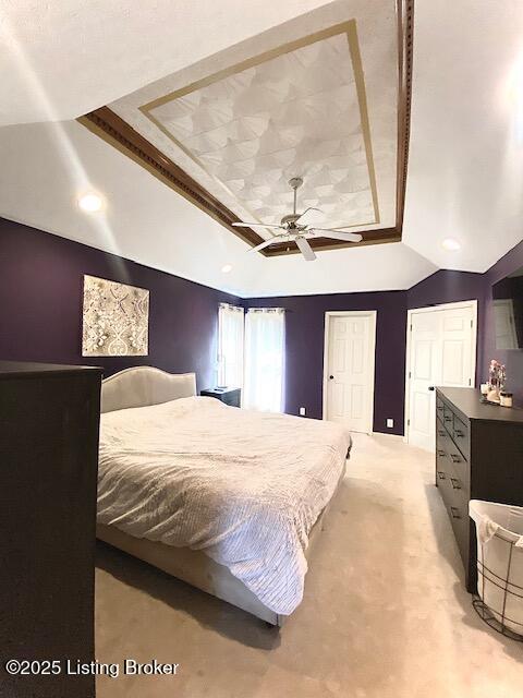 bedroom featuring vaulted ceiling and ceiling fan