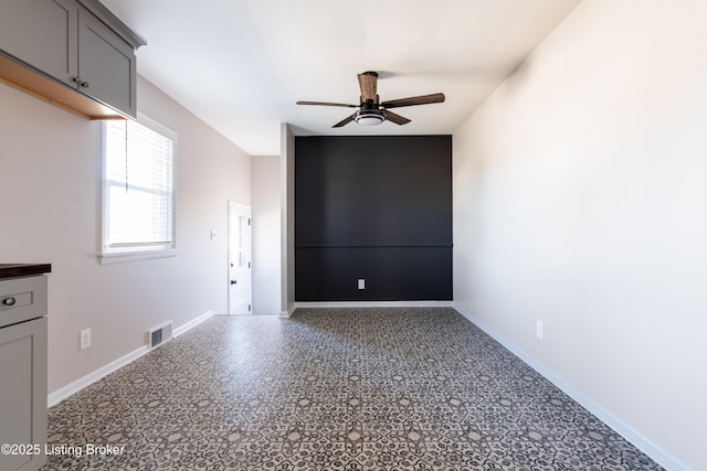 empty room with ceiling fan