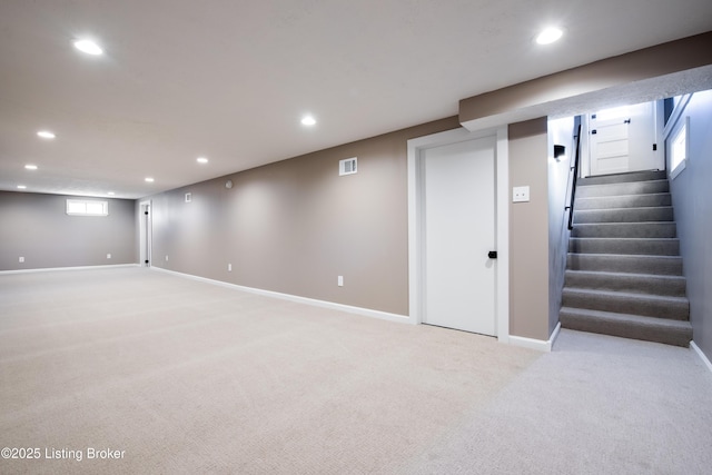 basement with light carpet