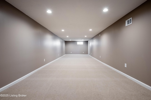 spare room featuring carpet flooring