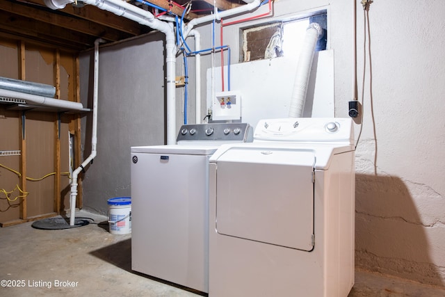 washroom featuring independent washer and dryer