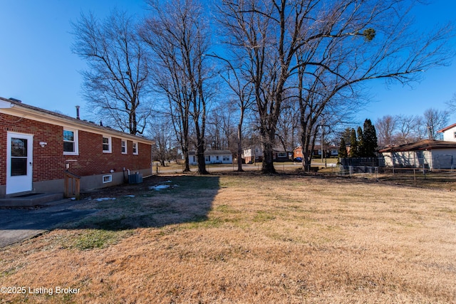 view of yard featuring central AC unit