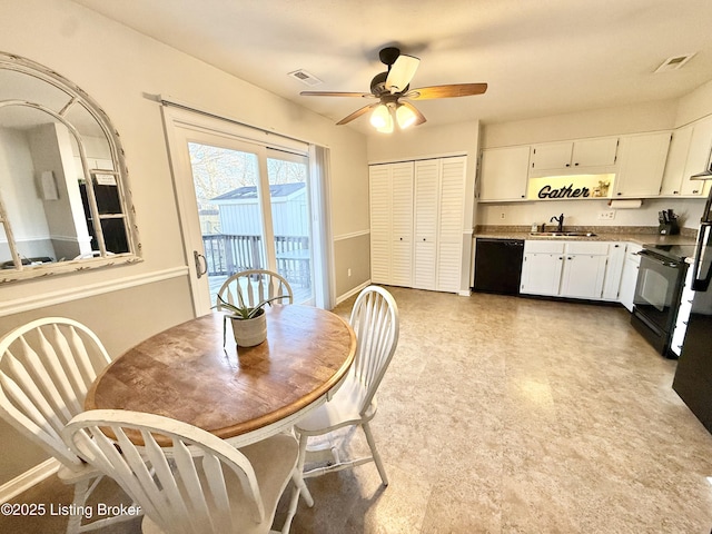 dining area with sink and ceiling fan