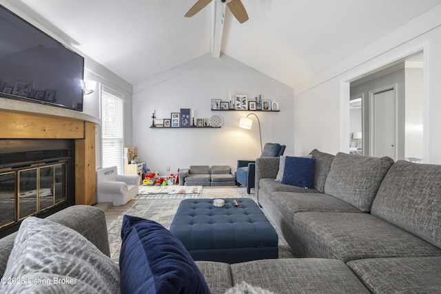 living room featuring hardwood / wood-style flooring and lofted ceiling with beams