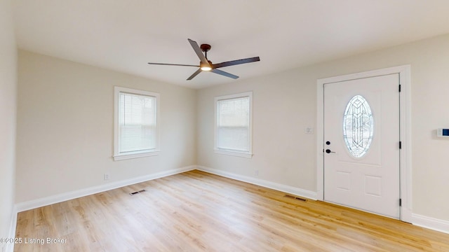 foyer featuring light hardwood / wood-style flooring and ceiling fan